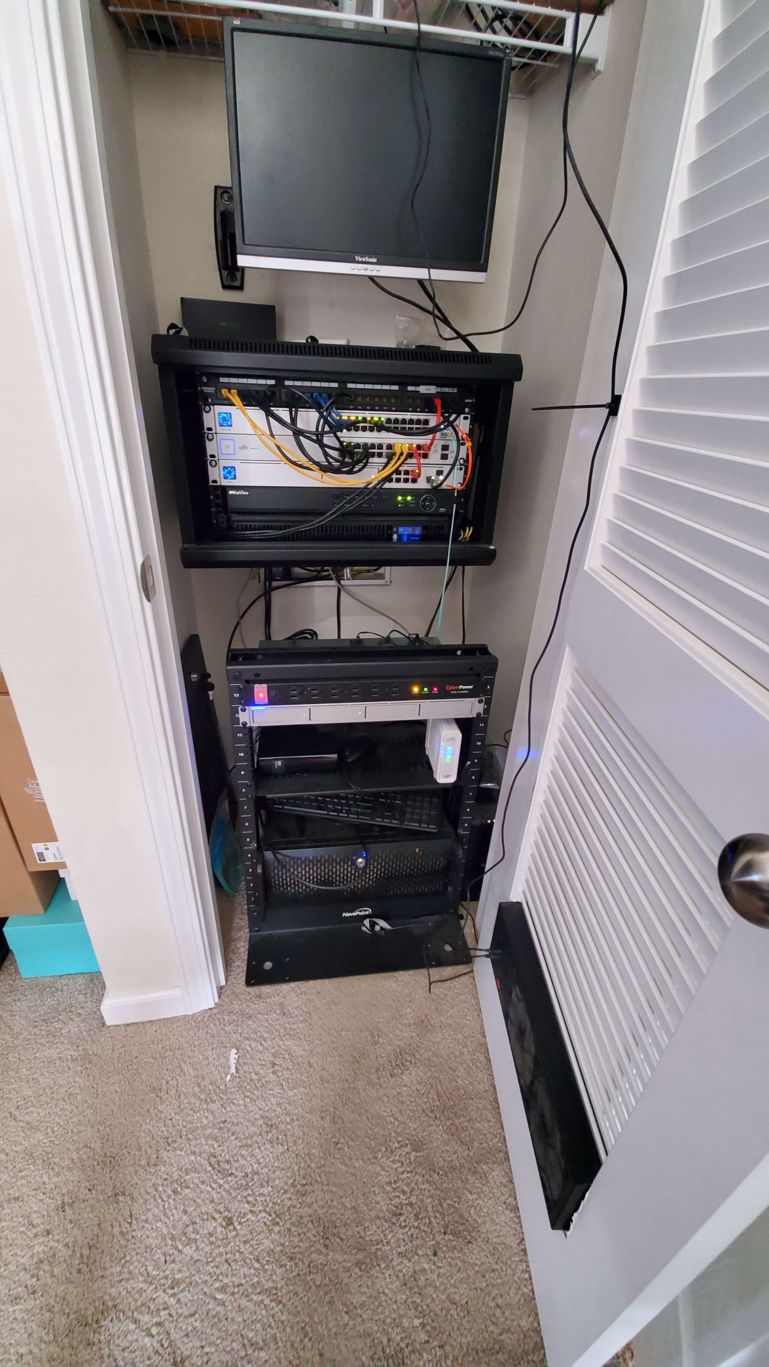 Advanced home setup with rack-mounted networking and AV equipment